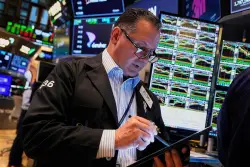 Wall Street, global markets mostly lower and oil prices drop $2 on hopes for a US-Iran nuclear deal